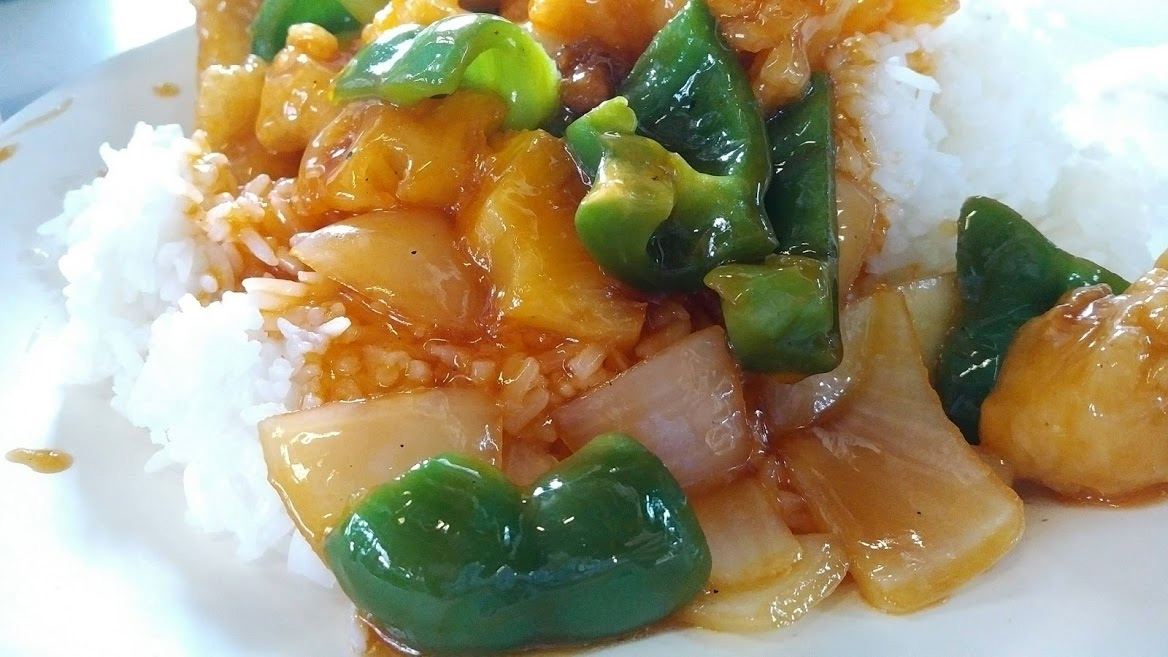 Chinese fried fish with bell pepper and pineapple sauce meal